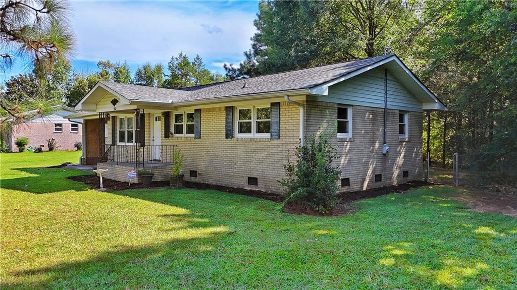 3 bedroom, 2 bathroom, 1,159 sq ft single family residence for sale at 552 Everett Springs Road, Calhoun, GA 30701 — photo 3