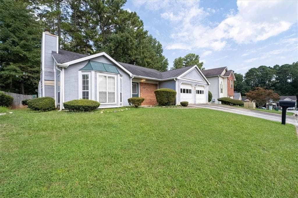 3 bedroom, 2 bathroom, 1,628 sq ft single family residence for sale at 511 Barclay Court, Stone Mountain, GA 30083 — photo 4