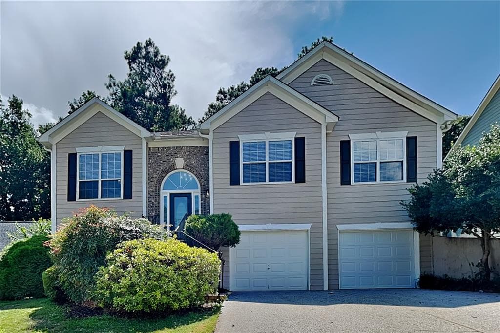 4 bedroom, 3 bathroom, 3,021 sq ft single family residence for rent at 1400 Stampmill Way, Lawrenceville, GA 30043 for $2,575 a month — photo 1 of 22