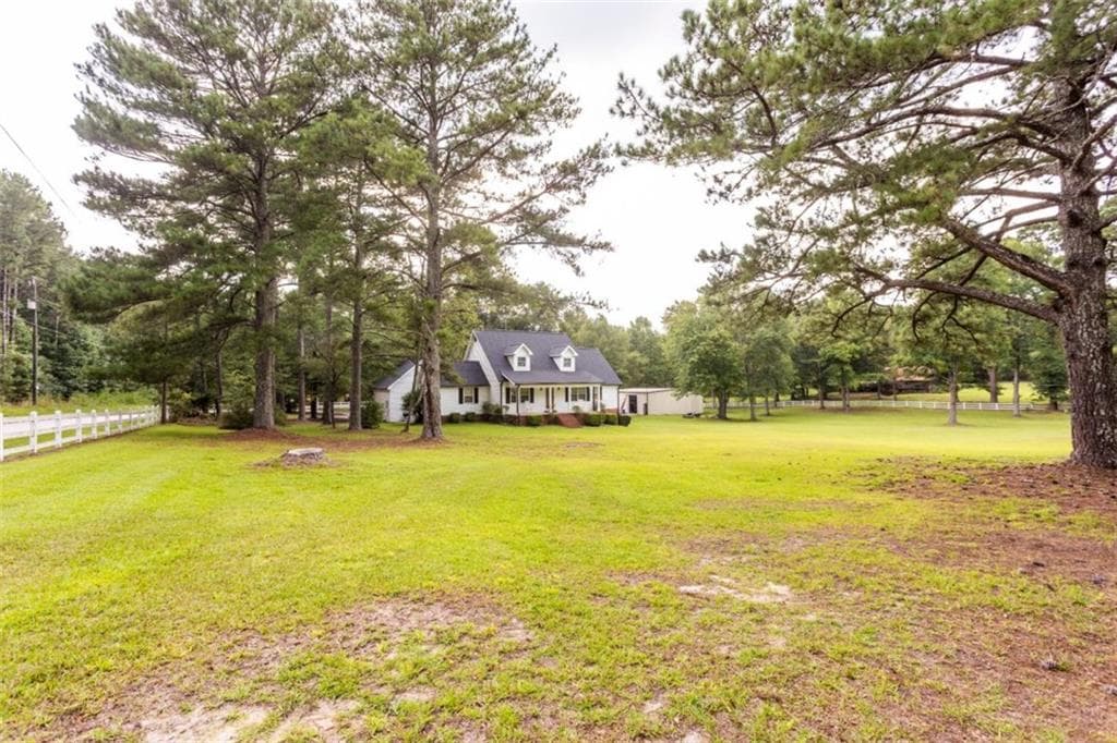 6 bedroom, 4 bathroom single family residence for sale at 3260 N Sharon Church Road, Loganville, GA 30052 — photo 8