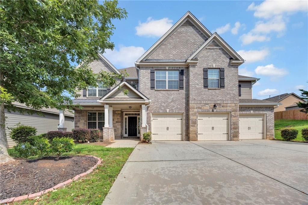 5 bedroom, 4 bathroom, 4,447 sq ft single family residence for sale at 910 Southfork Drive, Loganville, GA 30052