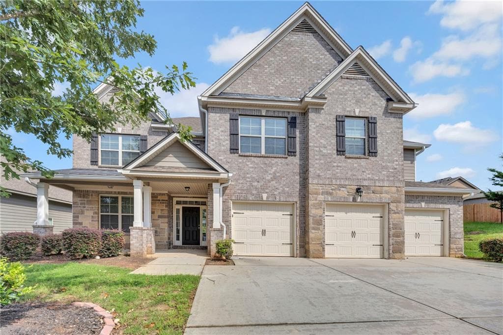 5 bedroom, 4 bathroom, 4,447 sq ft single family residence for sale at 910 Southfork Drive, Loganville, GA 30052 — photo 2