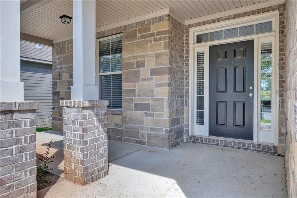 5 bedroom, 4 bathroom, 4,447 sq ft single family residence for sale at 910 Southfork Drive, Loganville, GA 30052 — photo 3