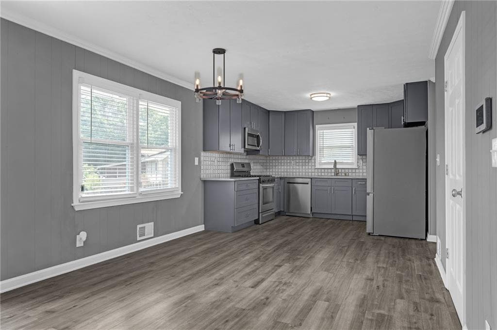 5 bedroom, 4 bathroom, 2,355 sq ft single family residence for sale at 497 Dicks Court, Lilburn, GA 30047 — photo 5