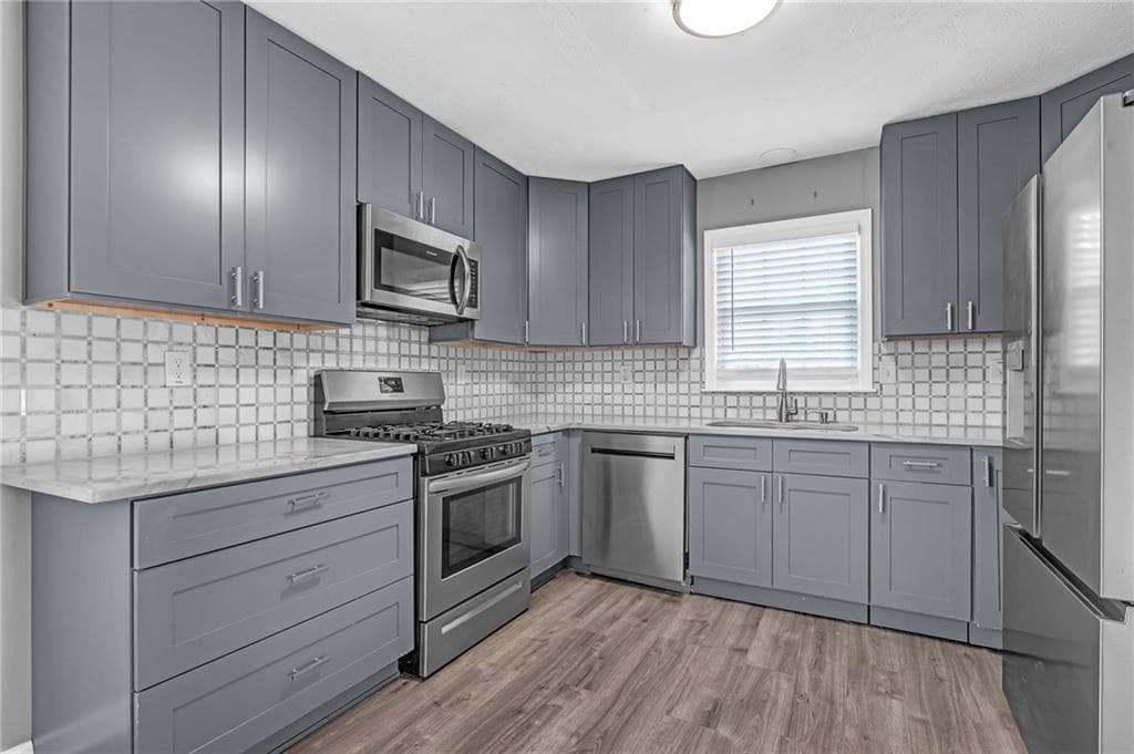 5 bedroom, 4 bathroom, 2,355 sq ft single family residence for sale at 497 Dicks Court, Lilburn, GA 30047 — photo 6