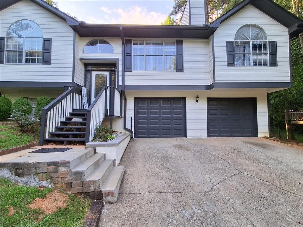 4 bedroom, 3 bathroom, 1,736 sq ft single family residence for rent at 1142 Riverside Trace, Buford, GA 30518 for $2,300 a month — photo 1 of 21