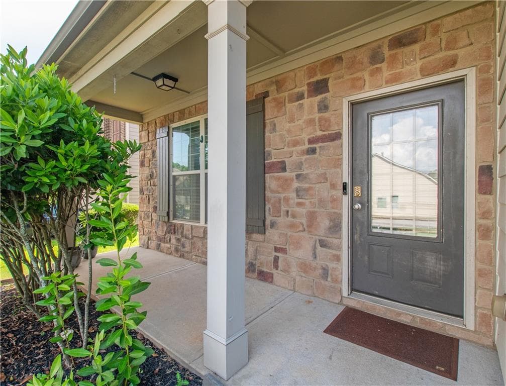 5 bedroom, 3 bathroom, 3,068 sq ft single family residence for sale at 7728 Old Thyme Road, Union City, GA 30291 — photo 2