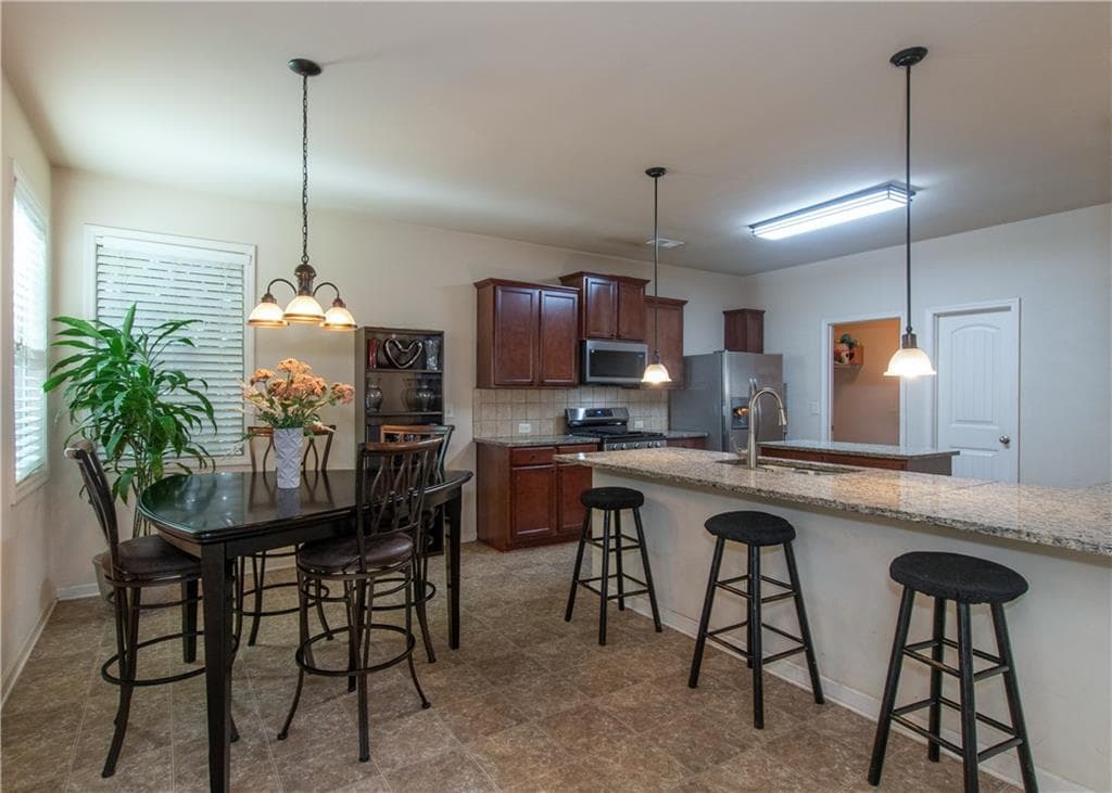 5 bedroom, 3 bathroom, 3,068 sq ft single family residence for sale at 7728 Old Thyme Road, Union City, GA 30291 — photo 9