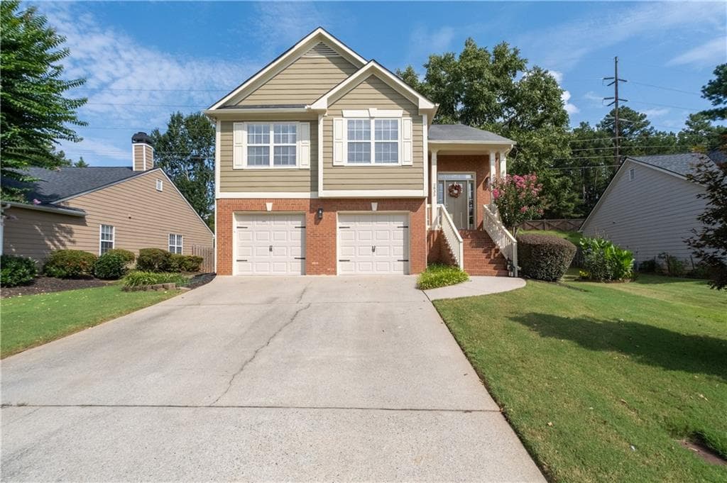 4 bedroom, 3 bathroom, 2,277 sq ft single family residence for sale at 2835 Dominion Walk Lane, Snellville, GA 30078