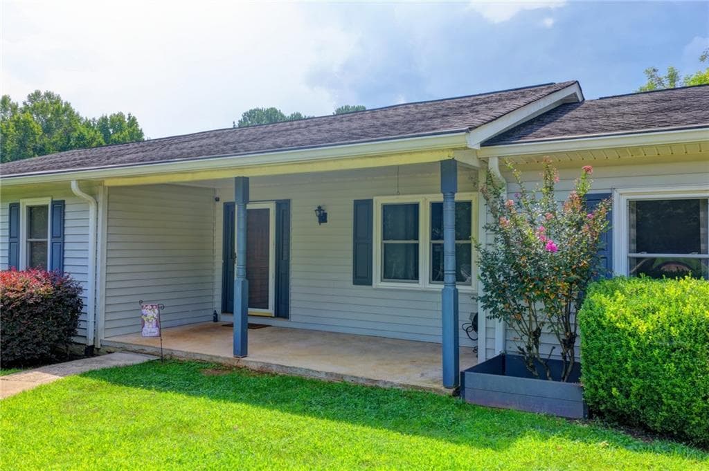 4 bedroom, 3 bathroom, 2,109 sq ft single family residence for sale at 4410 Meadow Trail, Cumming, GA 30028 — photo 2