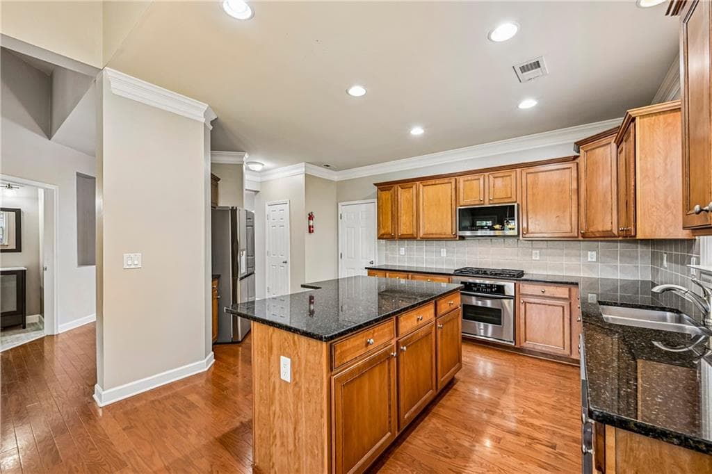 4 bedroom, 4 bathroom, 2,788 sq ft single family residence for sale at 4865 Silver Leaf Drive, Cumming, GA 30040 — photo 2