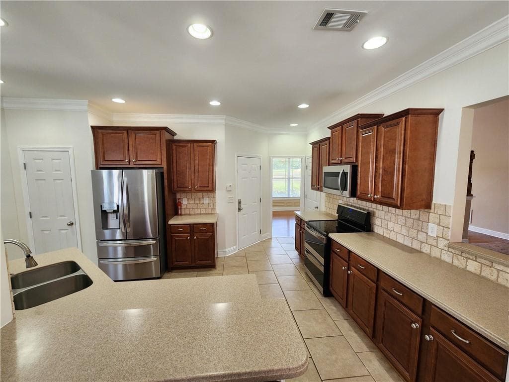 4 bedroom, 3 bathroom, 2,398 sq ft single family residence for sale at 1516 Maddox Lane, Monroe, GA 30656 — photo 10
