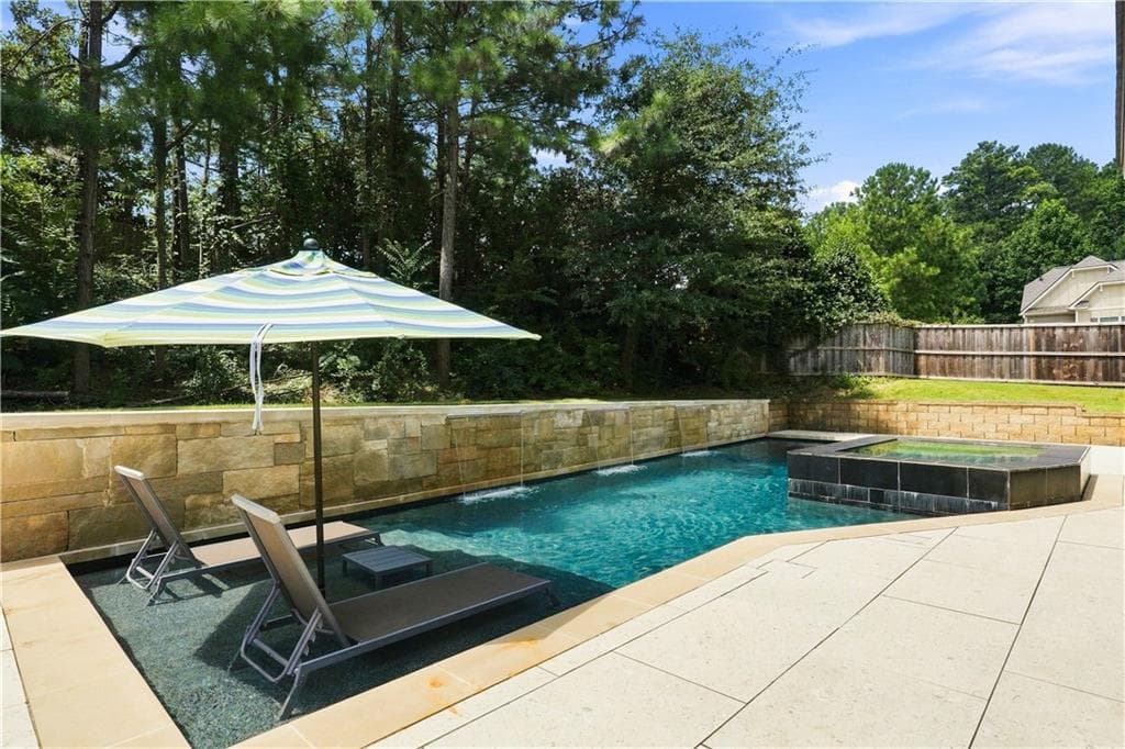 4 bedroom, 3 bathroom, 2,932 sq ft single family residence for sale at 2710 Evan Manor Lane, Cumming, GA 30041 — photo 2