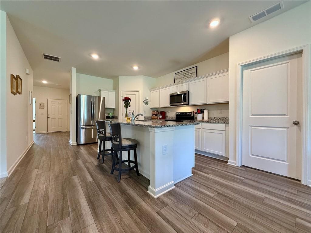 4 bedroom, 2 bathroom, 1,844 sq ft single family residence for sale at 240 Hyde Park, Winder, GA 30680 — photo 4