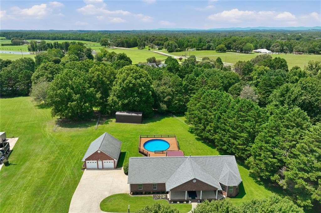 3 bedroom, 2 bathroom, 2,064 sq ft single family residence for sale at 5573 Clarks Bridge Road, Clermont, GA 30527 — photo 2