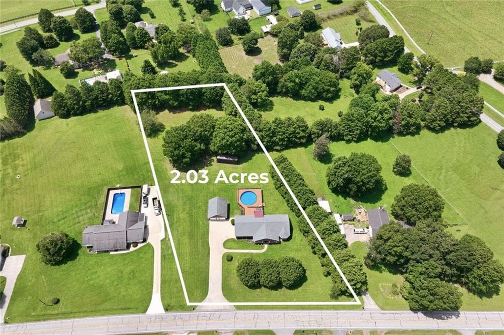 3 bedroom, 2 bathroom, 2,064 sq ft single family residence for sale at 5573 Clarks Bridge Road, Clermont, GA 30527 — photo 4