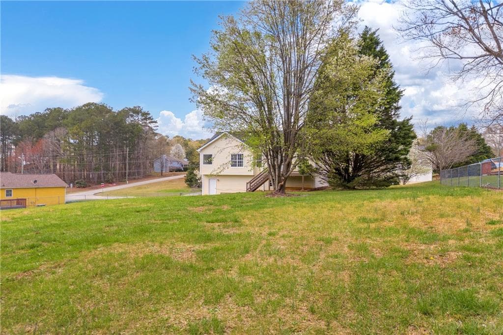4 bedroom, 2 bathroom, 1,828 sq ft single family residence under contract at 301 Jonaquil Avenue, Auburn, GA 30011 — photo 6