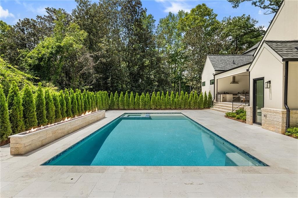 6 bedroom, 9 bathroom, 9,933 sq ft single family residence for sale at 388 Londonberry Rd, Sandy Springs, GA 30327 — photo 4