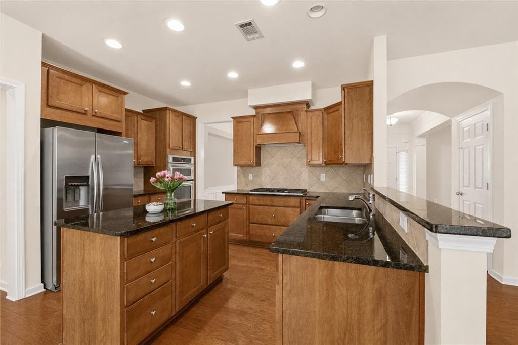 6 bedroom, 5 bathroom, 4,488 sq ft single family residence for sale at 4385 Colchester Creek Drive, Cumming, GA 30040 — photo 7