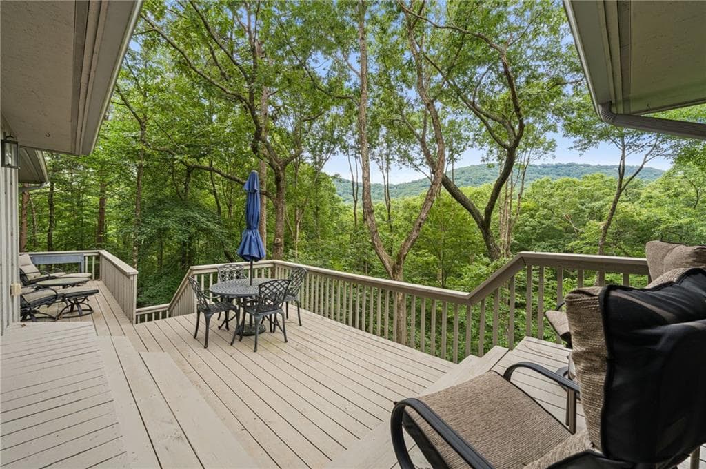 4 bedroom, 4 bathroom, 3,614 sq ft single family residence for sale at 4593 Wilderness Parkway, Big Canoe, GA 30143 — photo 2