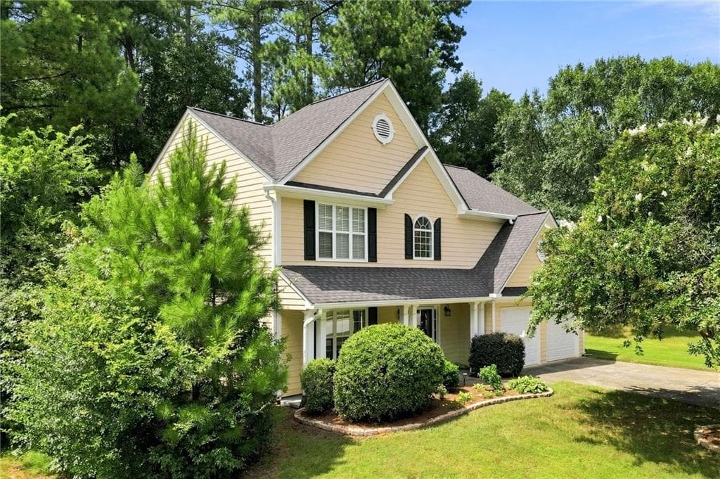 4 bedroom, 3 bathroom, 2,286 sq ft single family residence for sale at 1593 Woodmore Drive, Marietta, GA 30008 — photo 2