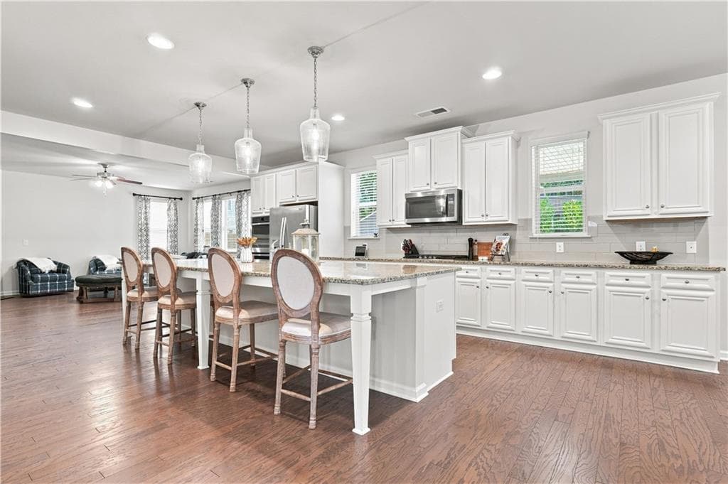 6 bedroom, 4 bathroom, 3,977 sq ft single family residence for sale at 2660 Ogden Trail, Buford, GA 30519 — photo 7