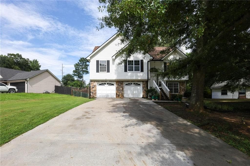 3 bedroom, 3 bathroom, 1,938 sq ft single family residence for sale at 75 Woodland Ridge Circle, Covington, GA 30016 — photo 2