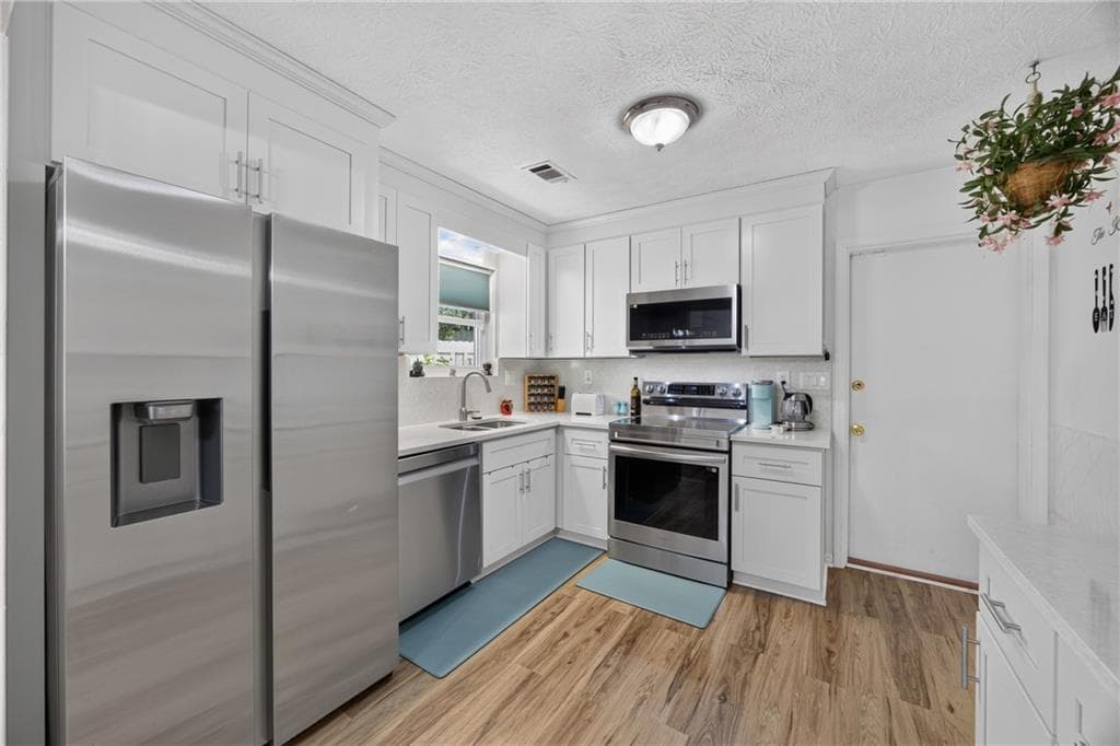3 bedroom, 2 bathroom, 1,210 sq ft single family residence for sale at 1019 Park West Lane, Stone Mountain, GA 30088 — photo 10
