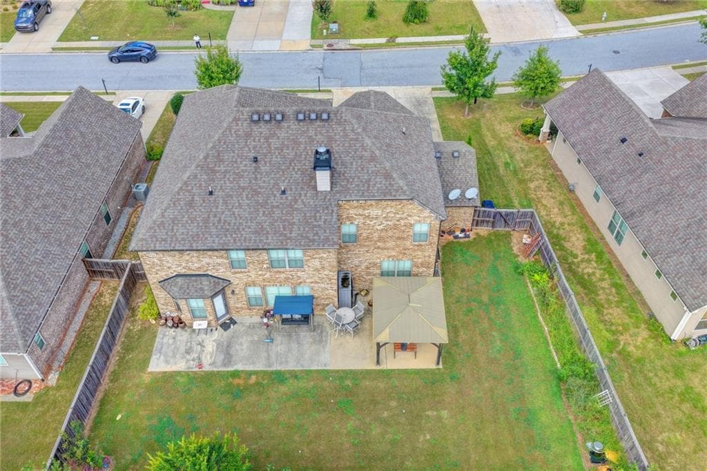 5 bedroom, 3 bathroom, 3,956 sq ft single family residence for sale at 3528 Tioga Lake Cove, Lawrenceville, GA 30044 — photo 4