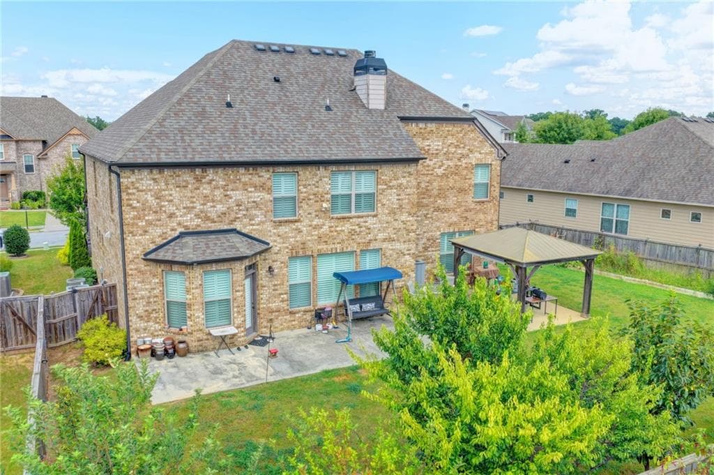 5 bedroom, 3 bathroom, 3,956 sq ft single family residence for sale at 3528 Tioga Lake Cove, Lawrenceville, GA 30044 — photo 5