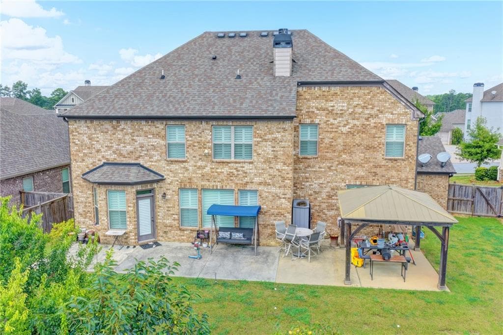 5 bedroom, 3 bathroom, 3,956 sq ft single family residence for sale at 3528 Tioga Lake Cove, Lawrenceville, GA 30044 — photo 6