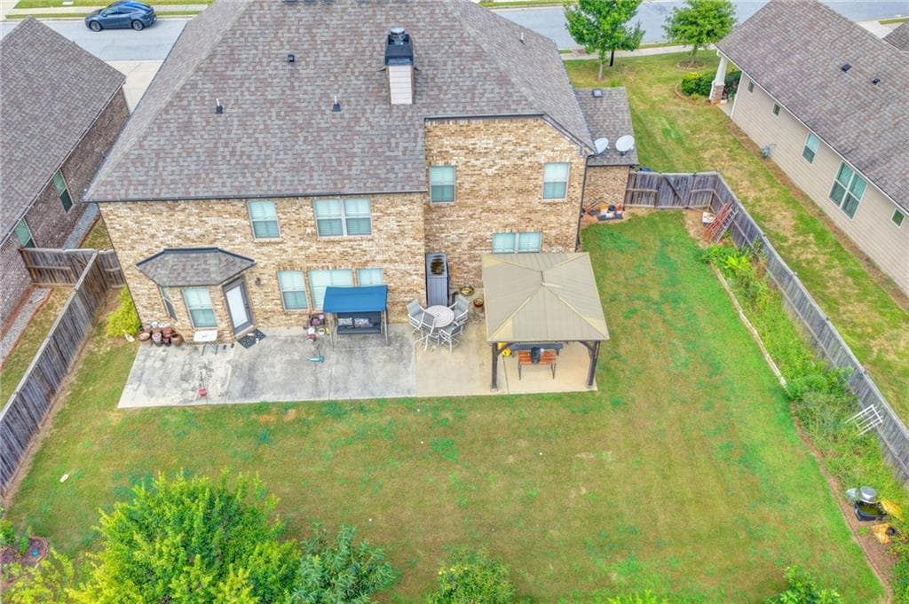 5 bedroom, 3 bathroom, 3,956 sq ft single family residence for sale at 3528 Tioga Lake Cove, Lawrenceville, GA 30044 — photo 7
