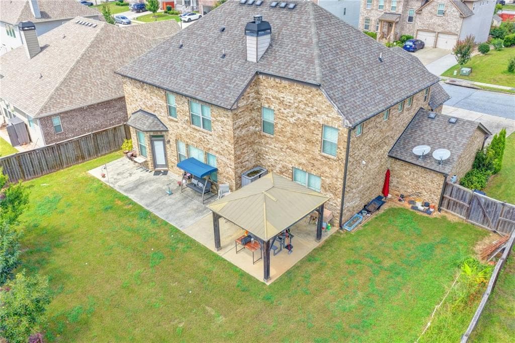 5 bedroom, 3 bathroom, 3,956 sq ft single family residence for sale at 3528 Tioga Lake Cove, Lawrenceville, GA 30044 — photo 8