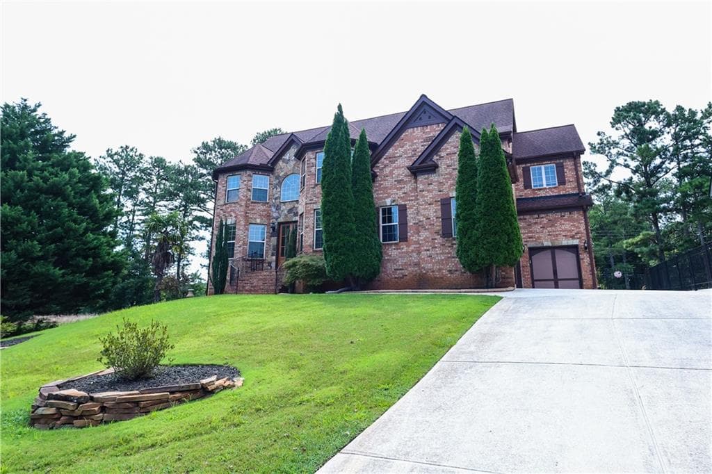 5 bedroom, 4 bathroom, 4,075 sq ft single family residence for sale at 2389 Apalachee Crucis Lane, Dacula, GA 30019 — photo 3