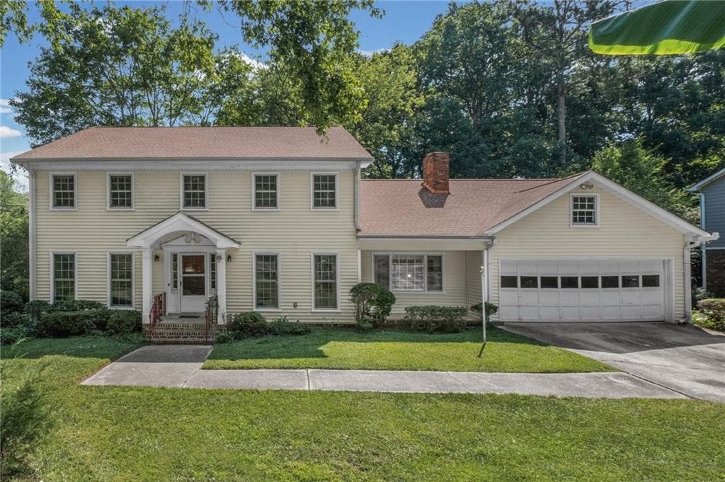 4 bedroom, 3 bathroom, 4,923 sq ft single family residence sold at 5171 Meadowlake Drive, Atlanta, GA 30338