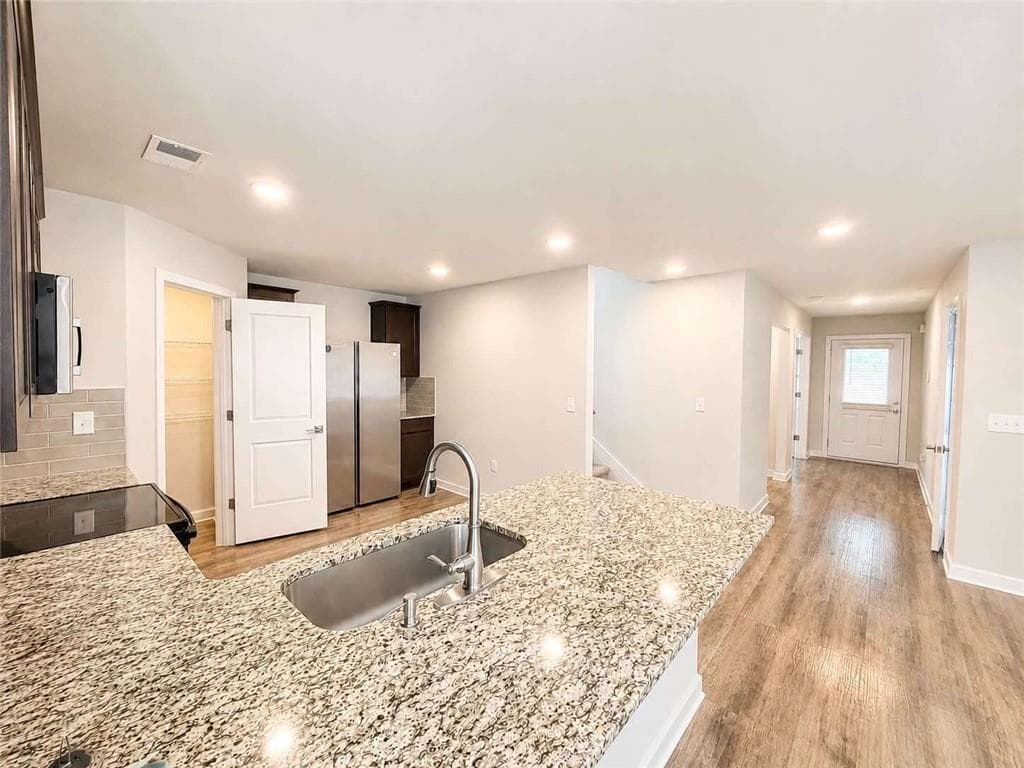 5 bedroom, 3 bathroom, 2,432 sq ft single family residence for sale at 403 Limerick Way, Hampton, GA 30228 — photo 10