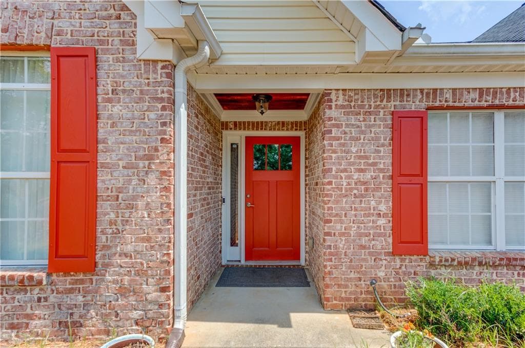 6 bedroom, 4 bathroom, 4,201 sq ft single family residence for sale at 1200 Amhearst Oaks Drive, Lawrenceville, GA 30043 — photo 2