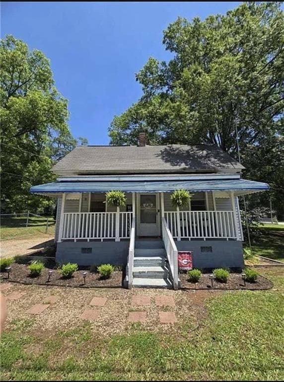 2 bedroom, 1 bathroom, 1,103 sq ft single family residence for sale at 5108 Hackett Street, Covington, GA 30014 — photo 1 of 13