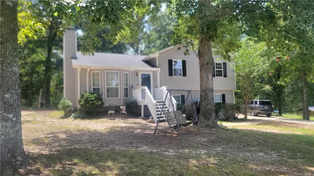 5 bedroom, 2 bathroom, 1,928 sq ft single family residence for sale at 124 Taylors Lane, Carrollton, GA 30117 — photo 2