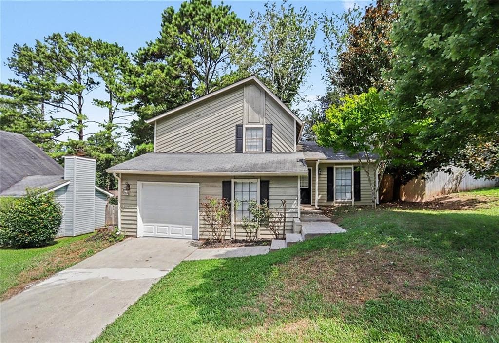 4 bedroom, 2 bathroom, 1,466 sq ft single family residence for sale at 706 Durham Crossing, Stone Mountain, GA 30083 — photo 1 of 20