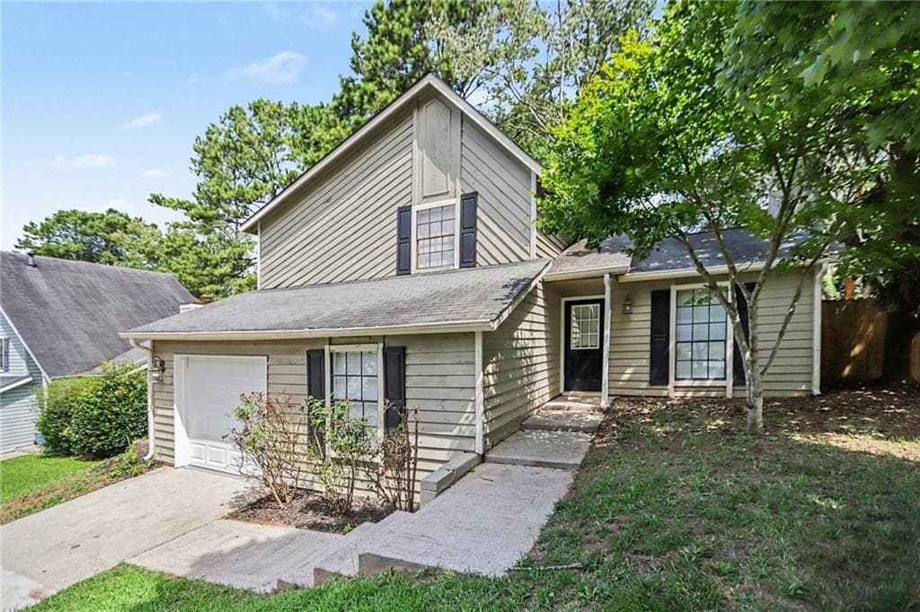 4 bedroom, 2 bathroom, 1,466 sq ft single family residence for sale at 706 Durham Crossing, Stone Mountain, GA 30083 — photo 2