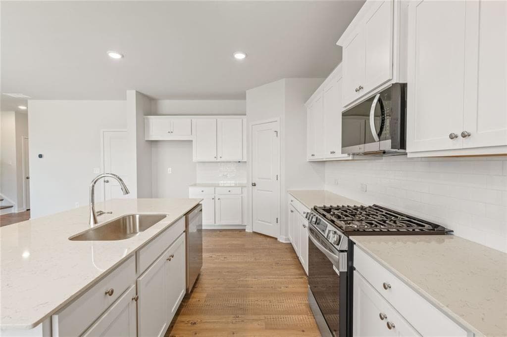 5 bedroom, 4 bathroom, 2,774 sq ft single family residence for sale at 313 Earnshaw Avenue, Mcdonough, GA 30253 — photo 7