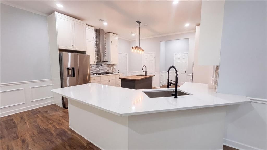 6 bedroom, 6 bathroom, 4,879 sq ft single family residence for sale at 321 Basel Way, Hampton, GA 30228 — photo 2