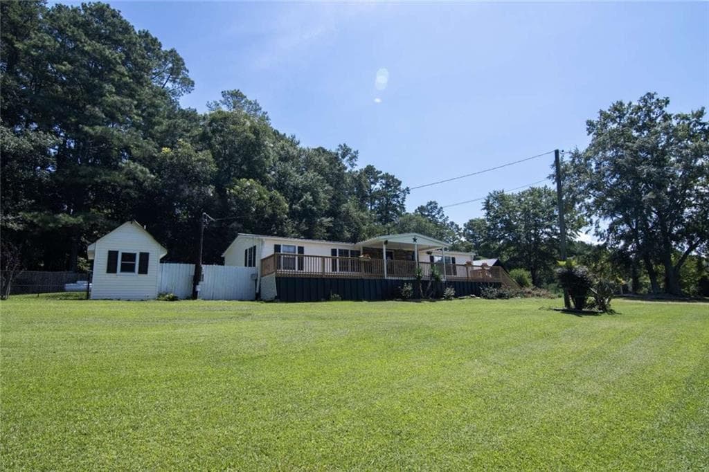 3 bedroom, 2 bathroom, 1,248 sq ft single family residence under contract at 5815 Hamby Drive, Cumming, GA 30028 — photo 2