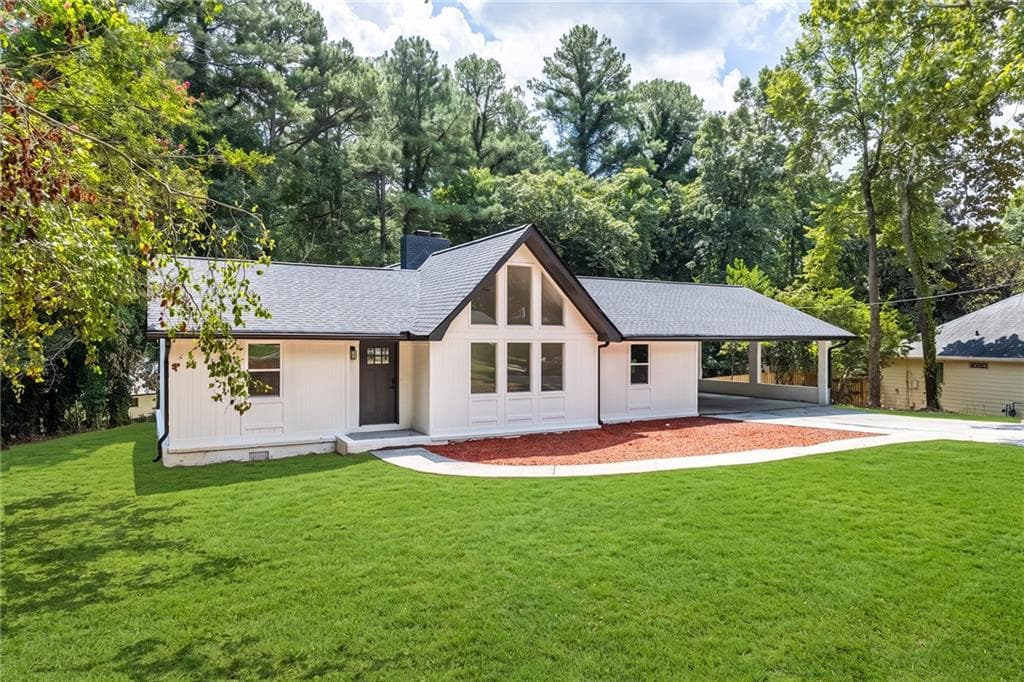 3 bedroom, 2 bathroom, 1,560 sq ft single family residence for sale at 3214 Kimberly Woods Court, Lilburn, GA 30047 — photo 2
