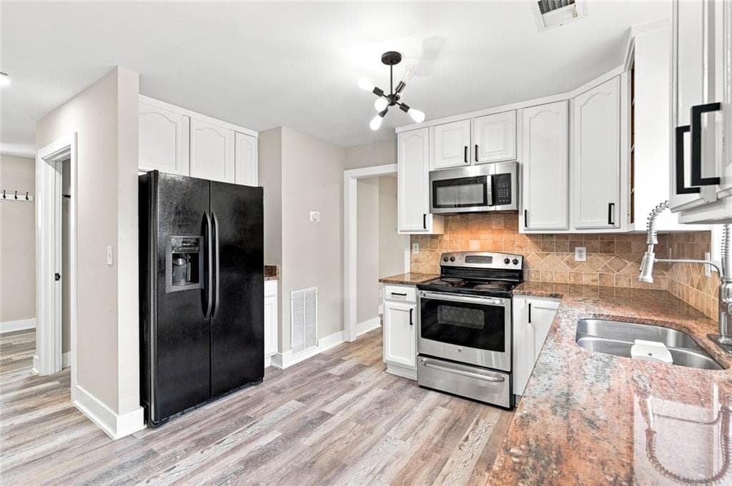 6 bedroom, 4 bathroom, 3,458 sq ft single family residence for sale at 1080 Big Haynes Drive, Grayson, GA 30017 — photo 7