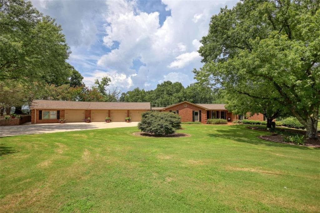 5 bedroom, 4 bathroom, 3,996 sq ft single family residence for sale at 3331 Highway 213, Mansfield, GA 30055