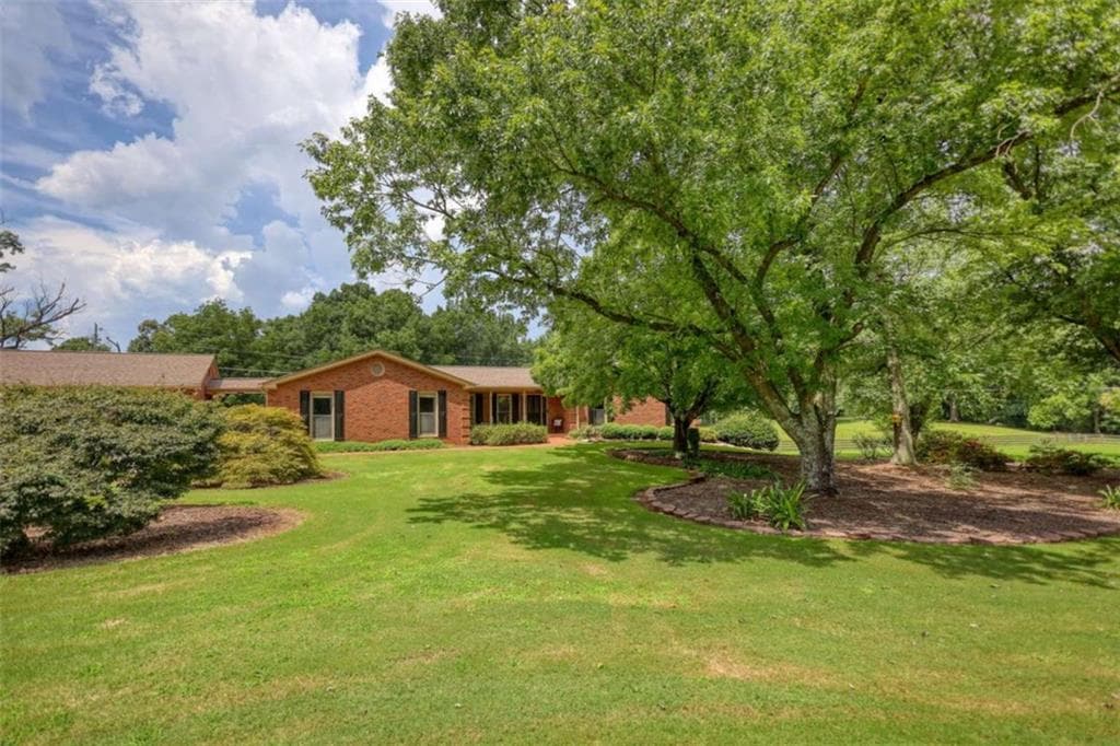 5 bedroom, 4 bathroom, 3,996 sq ft single family residence for sale at 3331 Highway 213, Mansfield, GA 30055 — photo 2