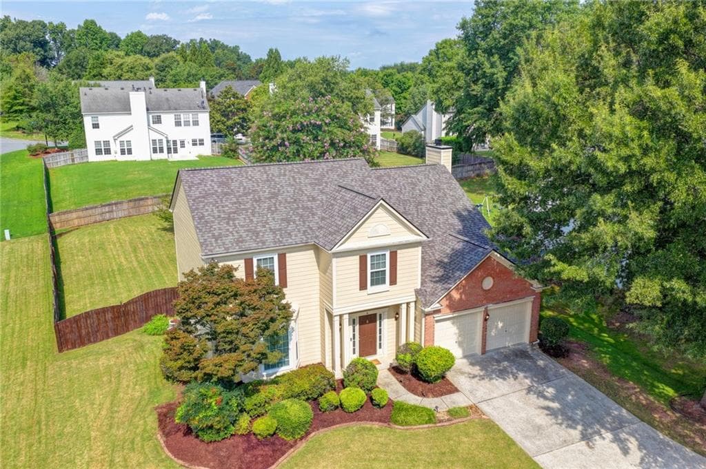 4 bedroom, 3 bathroom, 2,283 sq ft single family residence for sale at 900 Cherringham Court, Johns Creek, GA 30005 — photo 2