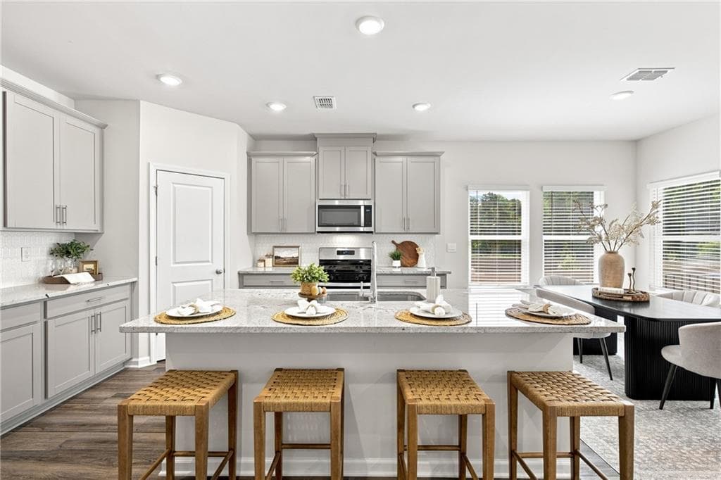4 bedroom, 3 bathroom, 2,418 sq ft single family residence for sale at 1638 High Falls Lane, Grayson, GA 30017 — photo 4